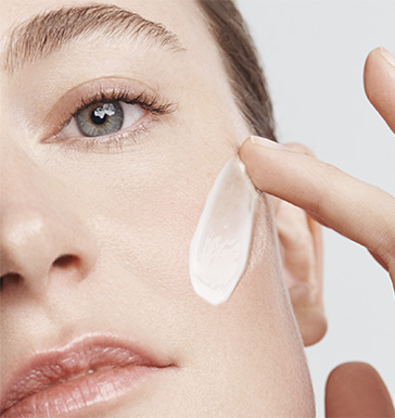 Model applying cream Model applying cream